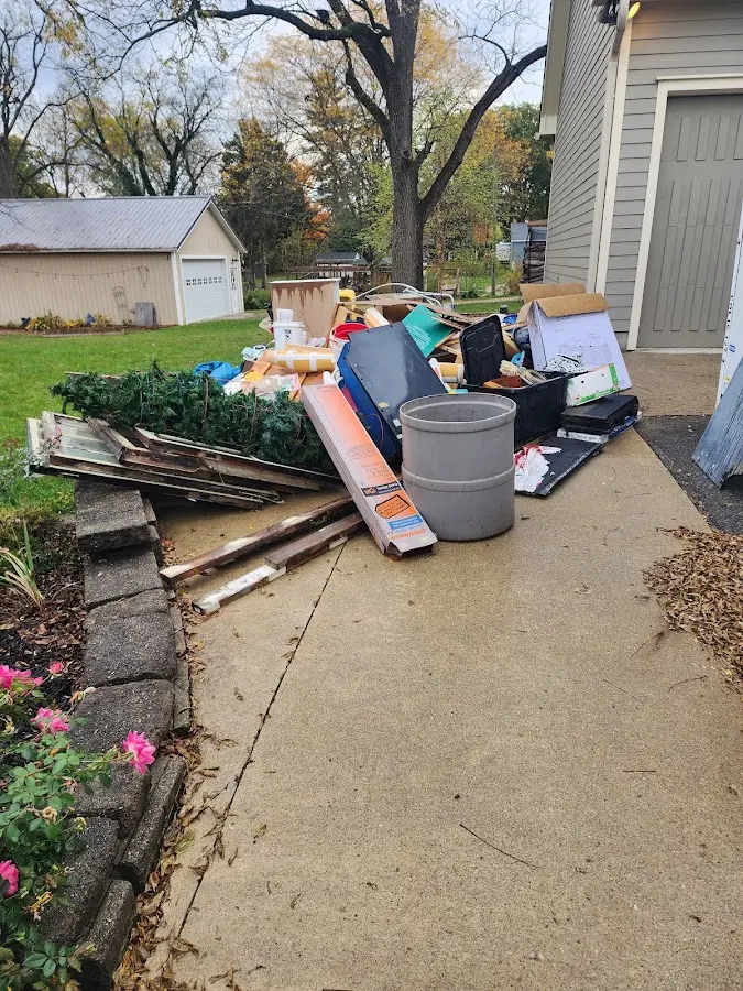 Dumpster being loaded with debris for 30 Yard Dumpster Rental in Atlanta